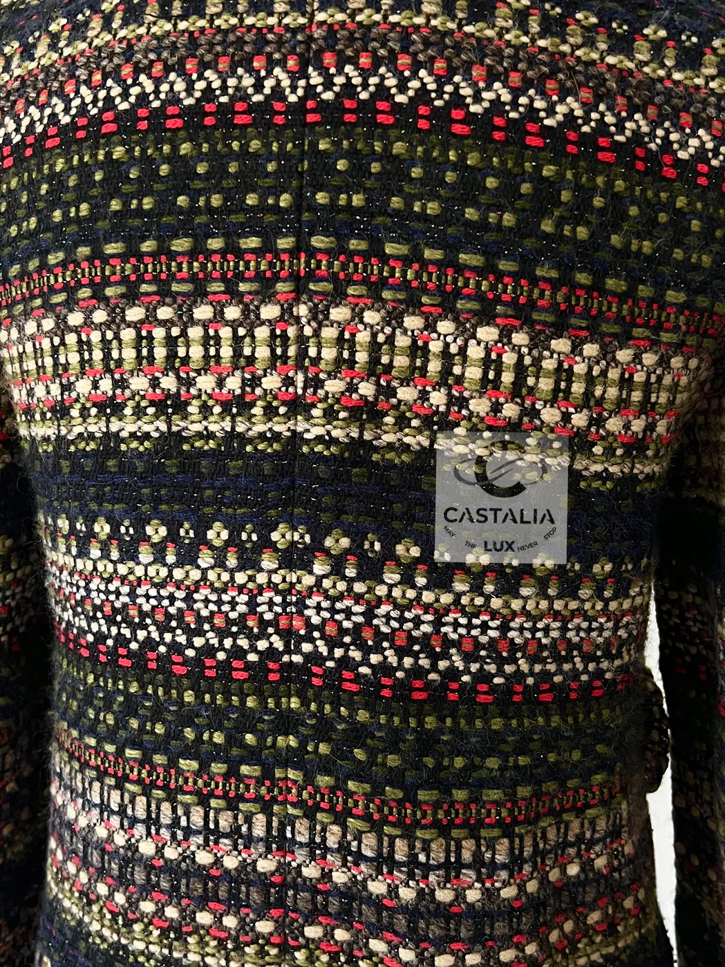 The tweed close: bands of flat stripes and raised looped rows in khaki, navy, crimson and ecru, with metallic glints