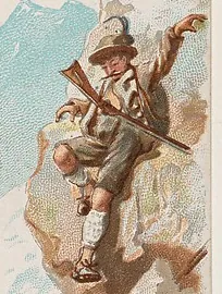 A Tyrolean hunter in a feathered hat and short jacket, climbing a rock with his rifle