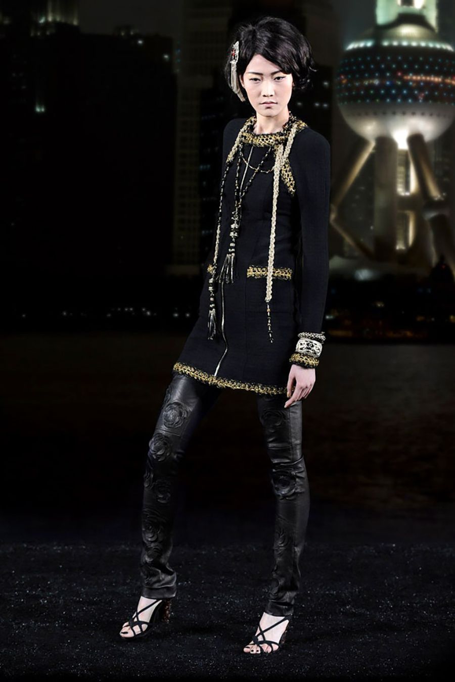 chanel Shanghai Look 21 black gold trim tweed coat runway.jpg